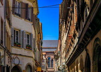 Fototapeta premium Ornate half timbered houses with restaurants and shops in the Carre d'Or in the old town of Grande Ile, the historic center of Strasbourg, Alsace, France