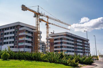 Construction of new modern buildings for housing in the expansion areas of Madrid, Spain.