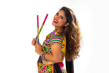 Portrait of a gujarati woman  dressed in a traditional Gujrati Attire, During the festival of Navratri