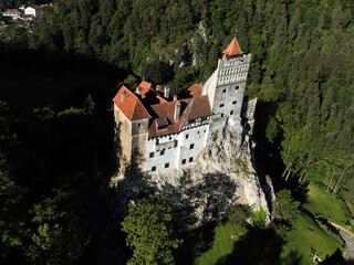 Fototapeta na wymiar Top view of Bran Castle, a 14th-century fortress in Transylvanian, Romania. Its historical depth is eclipsed by its cultural resonance as the legendary residence of the infamous vampire, Count Dracula
