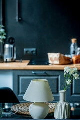 kitchen with lmap and vase