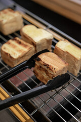 Pinching on bread toast