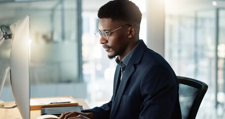 Thinking, businessman and reading on computer with a smile in office for email, feedback or...