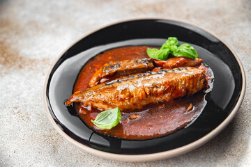 tasty mackerel tomato sauce and basil fresh canned fish seafood eating cooking appetizer meal food snack on the table copy space food background rustic top view
