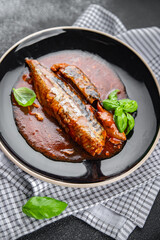 tasty mackerel tomato sauce and basil fresh canned fish seafood eating cooking appetizer meal food snack on the table copy space food background rustic top view