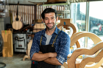 Acoustic Guitar Luthier Smiling in Workshop Portrait