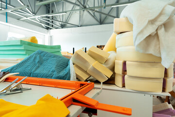 Stacked materials for furniture upholstery in furniture factory