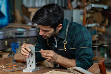 Guitar Luthier Bends Fretwire