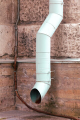 Drain pipe on the wall of the house