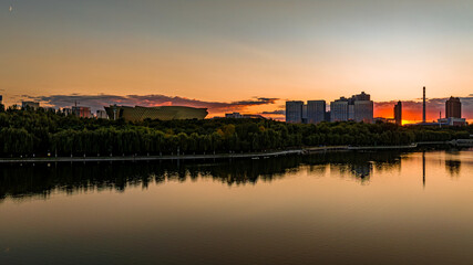 Fototapeta premium Sunset landscape of southern new town in Changchun, China 
