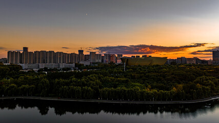Fototapeta premium Sunset landscape of southern new town in Changchun, China 