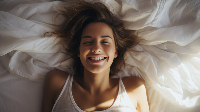 photo of a woman of about 40 lying on her bed, in a white T-shirt, happy, smiling, relaxed, clean, silky hair, well-being, very bright natural light - Generative AI