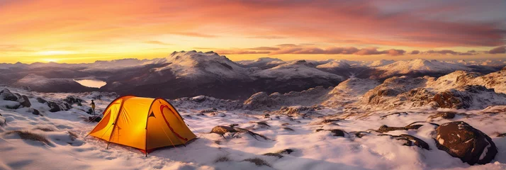 Fotobehang the middle of winter, snowy, golden sunrise illuminating tent camping dramatic mountain landscape panorama scotland - Generative AI © seogi