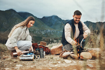Couple, camping and fire in nature, mountains and outdoor for sustainable heating, vacation and prepare kettle. Happy man and woman in field with water, campfire or flames for cooking on holiday - obrazy, fototapety, plakaty