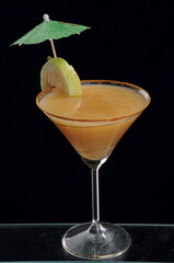 Guava Cocktail Mocktail shot against a white background with garnish and props