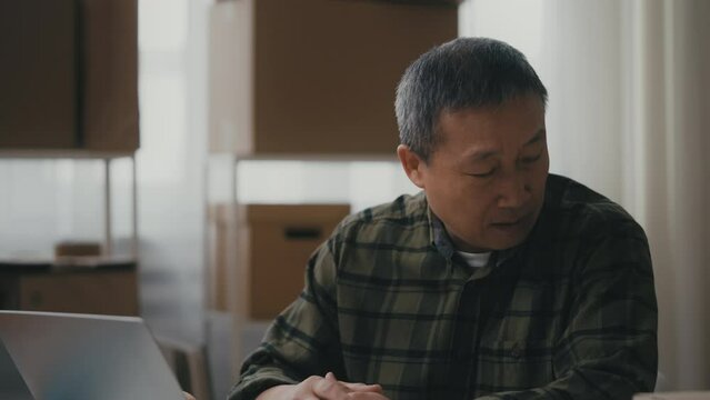 Asian small business owner feeling stressed, profit decline crisis, bad venture