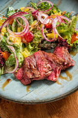 grilled meat with fresh vegetables