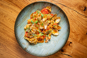 seafood pasta on the wooden background