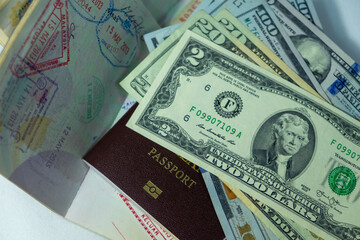 US Dollars Bills on passports with Visa stamps