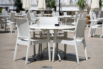 outdoor restaurant atmosphere, dining table in luxury restaurant