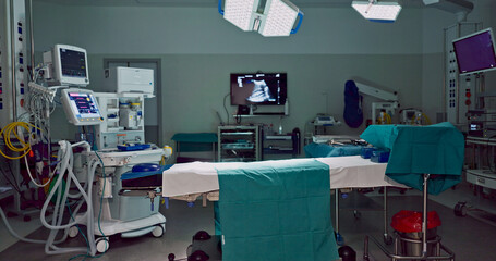 Empty, dark hospital and room for operation, emergency service and healing patient. Healthcare...