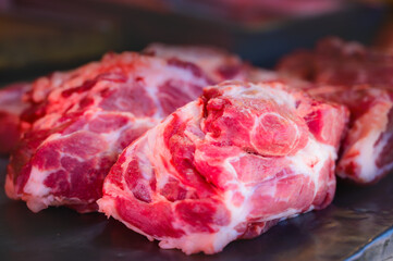 Fresh pork on the market stall