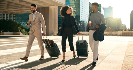 Business people, team walking and travel with suitcase in city for corporate, job opportunity and networking. Professional woman and men talking at outdoor hotel or on the way to airport with luggage - obrazy, fototapety, plakaty