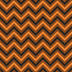 Seamless pattern for halloween decoration for kids party. Zigzag pattern. Dark orange background with orange and black zigzag lines. Pattern for kids fabric, wrapping, textile, posters