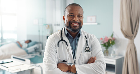 Medicine, doctor and black man with arms crossed at hospital with smile for support, service and wellness. Healthcare, professional and African expert with happiness and pride for career and surgery - Powered by Adobe
