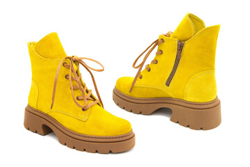 Fashionable suede leather boots isolated on white background. View from all sides.