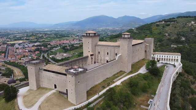 Aerial view of Albornozian Fortress of Spoleto located in Umbria (central Italy). We can see the courtyard called "Cortile delle Armi", intended for soldiers. Orbital move.