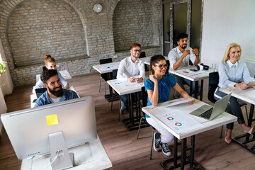 Group of multinational business people develop themselves in business training, meeting in office