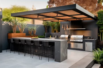Fotobehang outdoor patio entertainment area with a built - in barbecue and a bar setup © KEA
