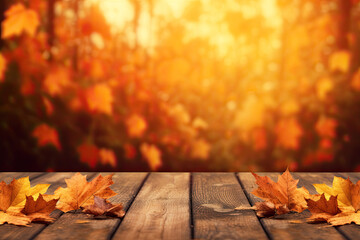 Naklejka na ściany i meble Wooden table with orange fall leaves