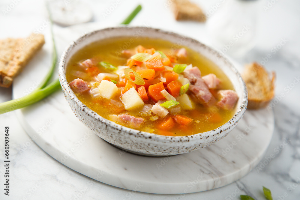 Wall mural traditional pea soup with ham and vegetables