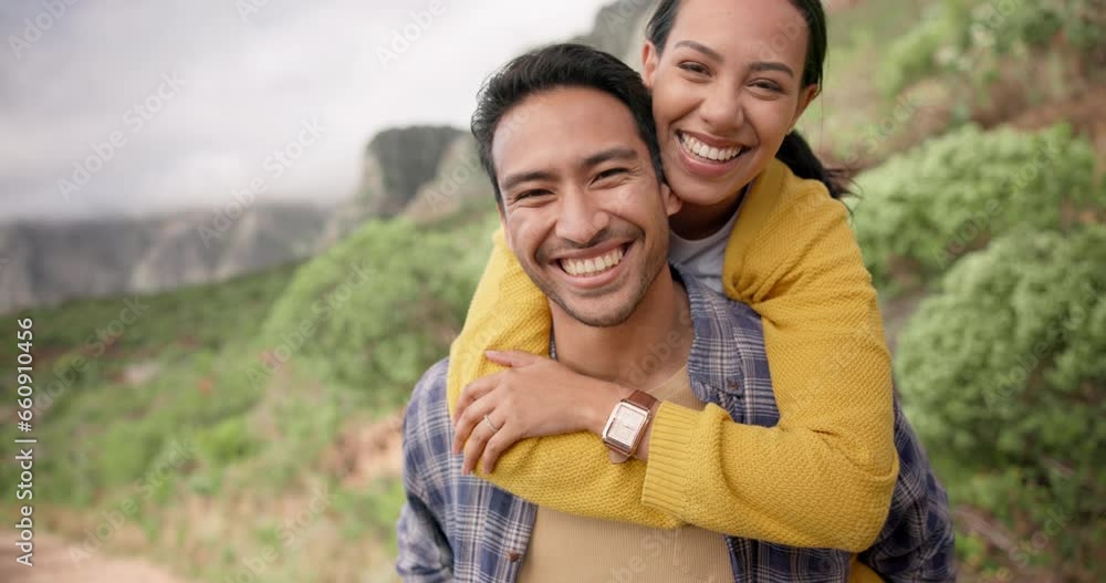 Wall mural Piggy back, hiking and face of couple on mountain for trekking, adventure and journey in nature. Travel, dating and portrait of happy man carrying woman outdoors for holiday, vacation and wellness