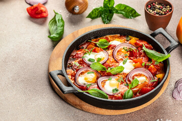 Shakshuka egg for breakfast in pan. Restaurant menu, dieting, cookbook recipe top view