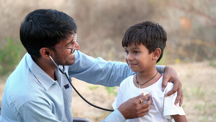 Health checkup, Children medical insurance care. Indian young doctor of pediatrician holding...