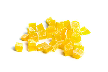 Dried mango cubes isolated on white background. Diced mango closeup. Heap of sweetened fruits. Candied mango is nature's way of treating your taste buds to a sugary delight.