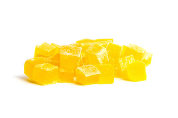 Dried mango cubes isolated on white background. Diced mango closeup. Heap of sweetened fruits. Dehydrated mango create a delectable duo of flavor and texture.