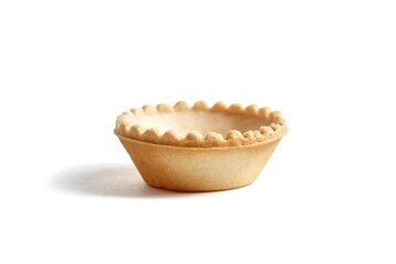 Unfilled tartlet shell isolated on white background. Empty tartlet cup. Clean and pristine tartlet cup on white