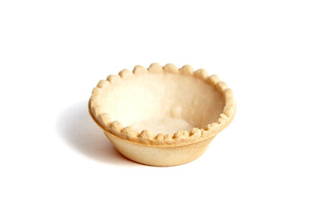 Unfilled tartlet shell isolated on white background. Empty tartlet cup. White background showcasing empty tartlet shell