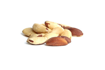 Obraz premium Brazil nuts isolated on white background. Shelled Brazil nuts, a nutty treat
