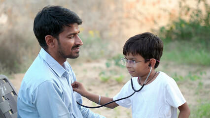 Health checkup, Children medical insurance care. Indian kid doctor of pediatrician holding...