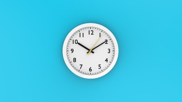 Part of white wall clock with yellow second hand hanging on wall. turquiose blue background