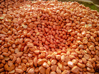 close up of a lot of beans, peanut, nut, brown nut, many nuts