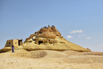 Siwa, egypt - October 7th 2022 - Photo of the mountain of the dead at siwa oasis egypt - obrazy, fototapety, plakaty