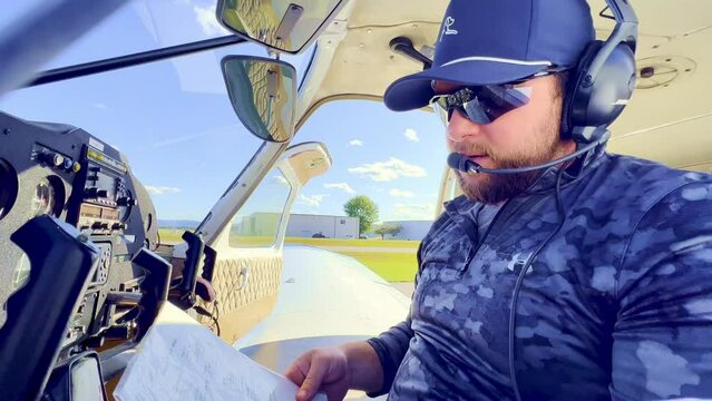private pilot does preflight inspection of piper cherokee 180 prior to flight