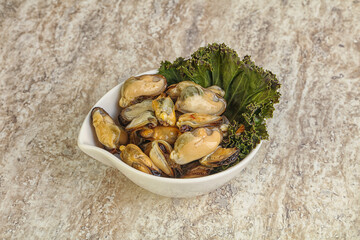 Tasty marinated mussels in the bowl