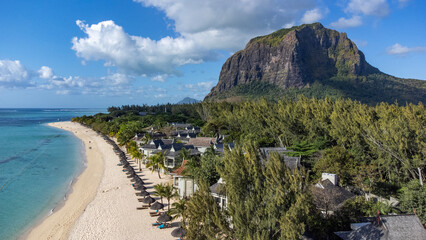 Le Morne tropical beach and famous kite, surf spot aerial panoramic view with palm trees and white...